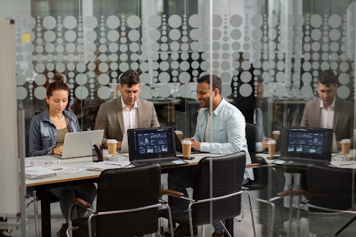 Trifecta IT Solutions advisor reviewing a managed IT services budget with a San Diego, CA business owner